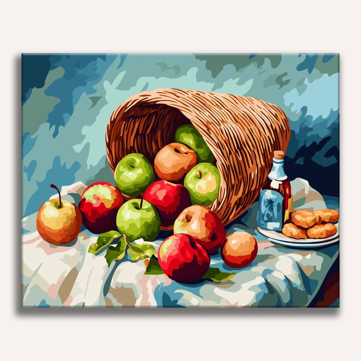 A wicker basket filled with ripe apples sits on a blue surface, surrounded by a few whole apples and an empty bottle nearby..