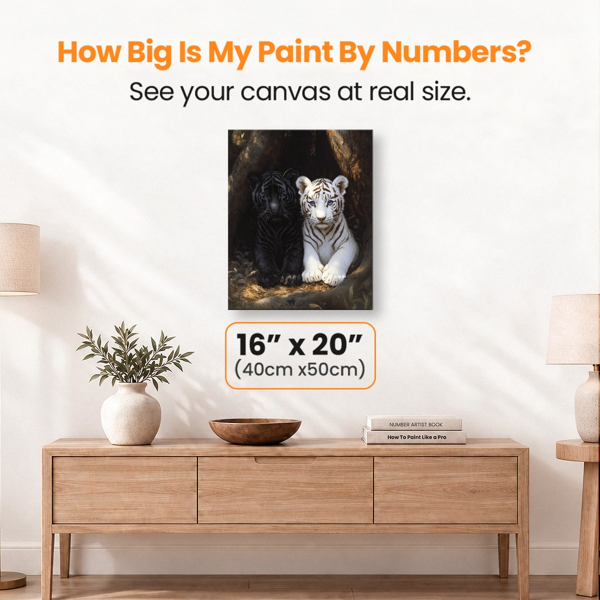 A striking poster features two cubs, one black and one white, resting within a natural tree cavity.