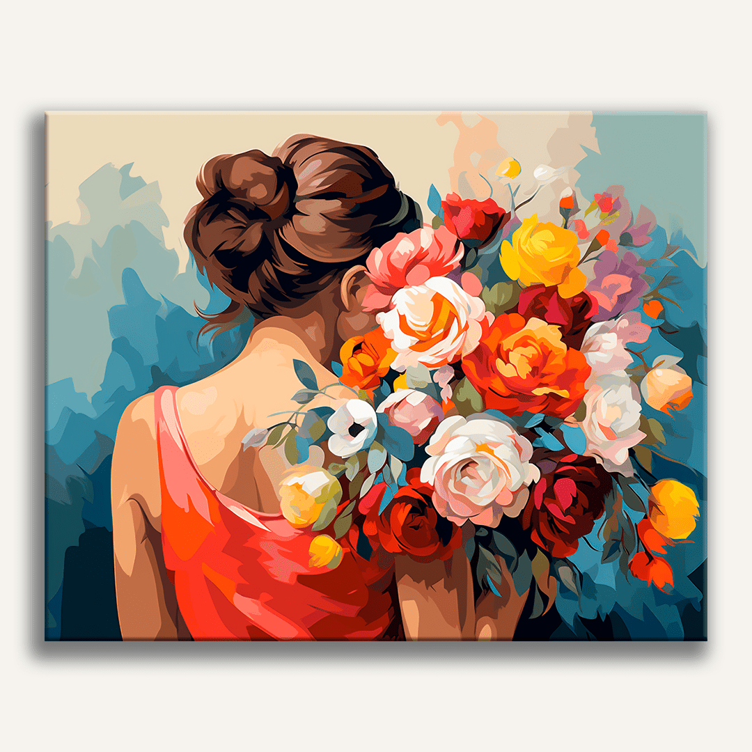 A woman stands among a vibrant array of flowers in full bloom.