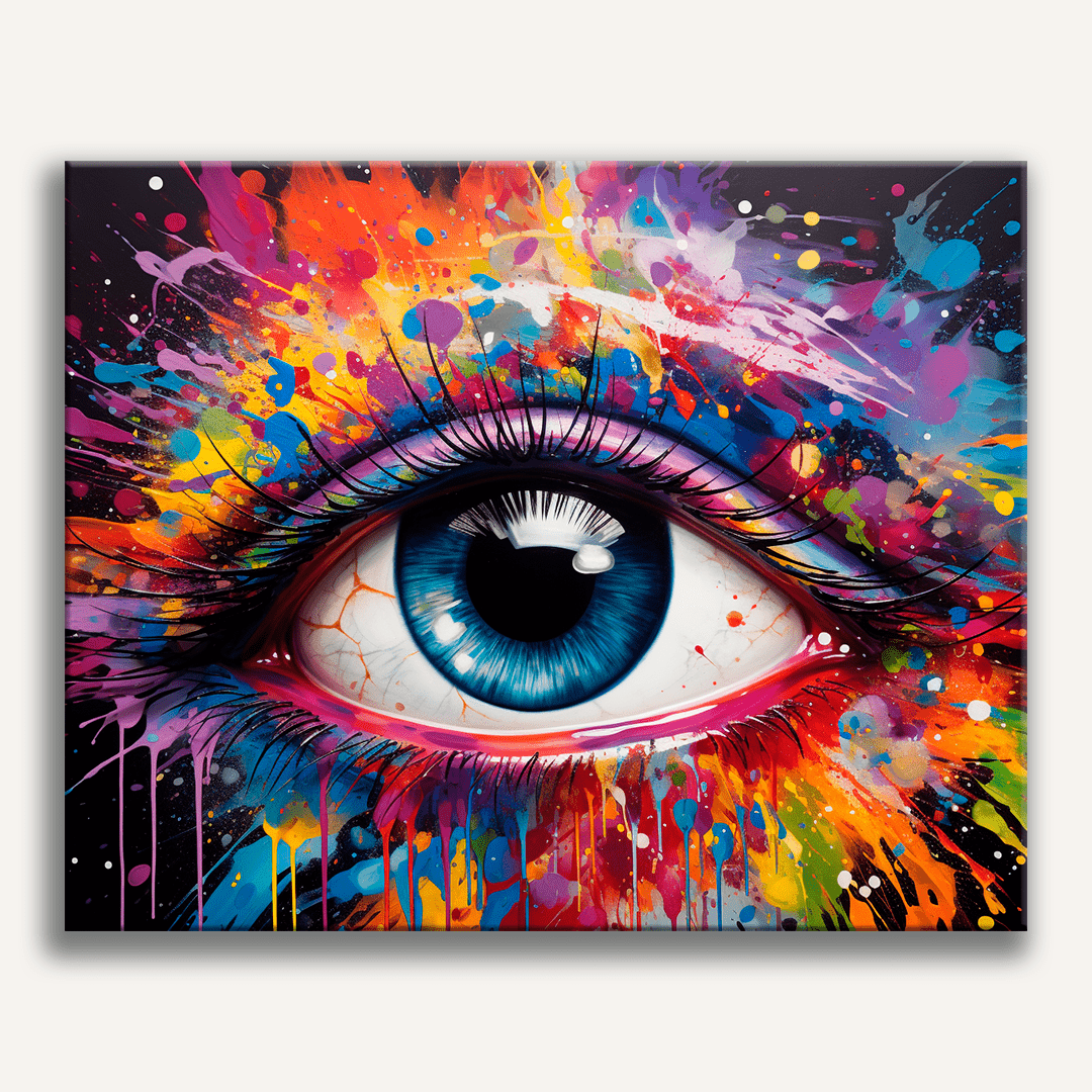 A close-up of a colorful eye with an intricate design resembling a mosaic of various colors and shapes.