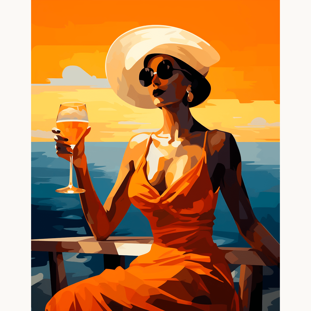 A woman in a vibrant red dress stands on a deck railing, holding a glass of white wine and overlooking a sunset or sunrise.