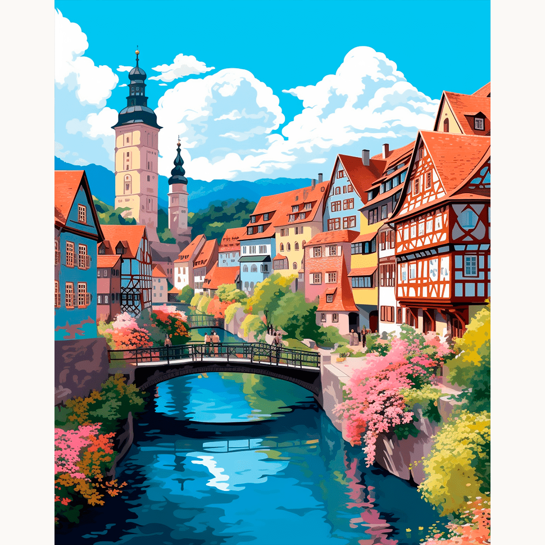 The image showcases a picturesque European town, nestled amidst lush greenery.