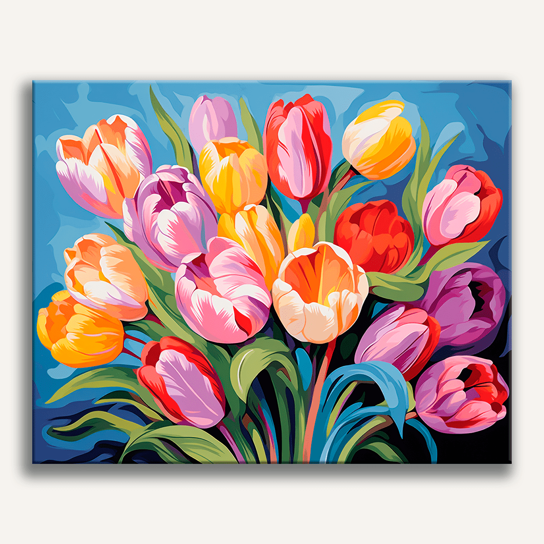 A vibrant bouquet of tulips in full bloom against a blue background.